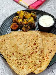 4 Paratha + matar aloo + jeera aloo
