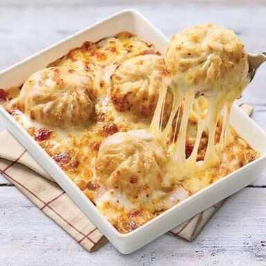 baked cheesy veg momo