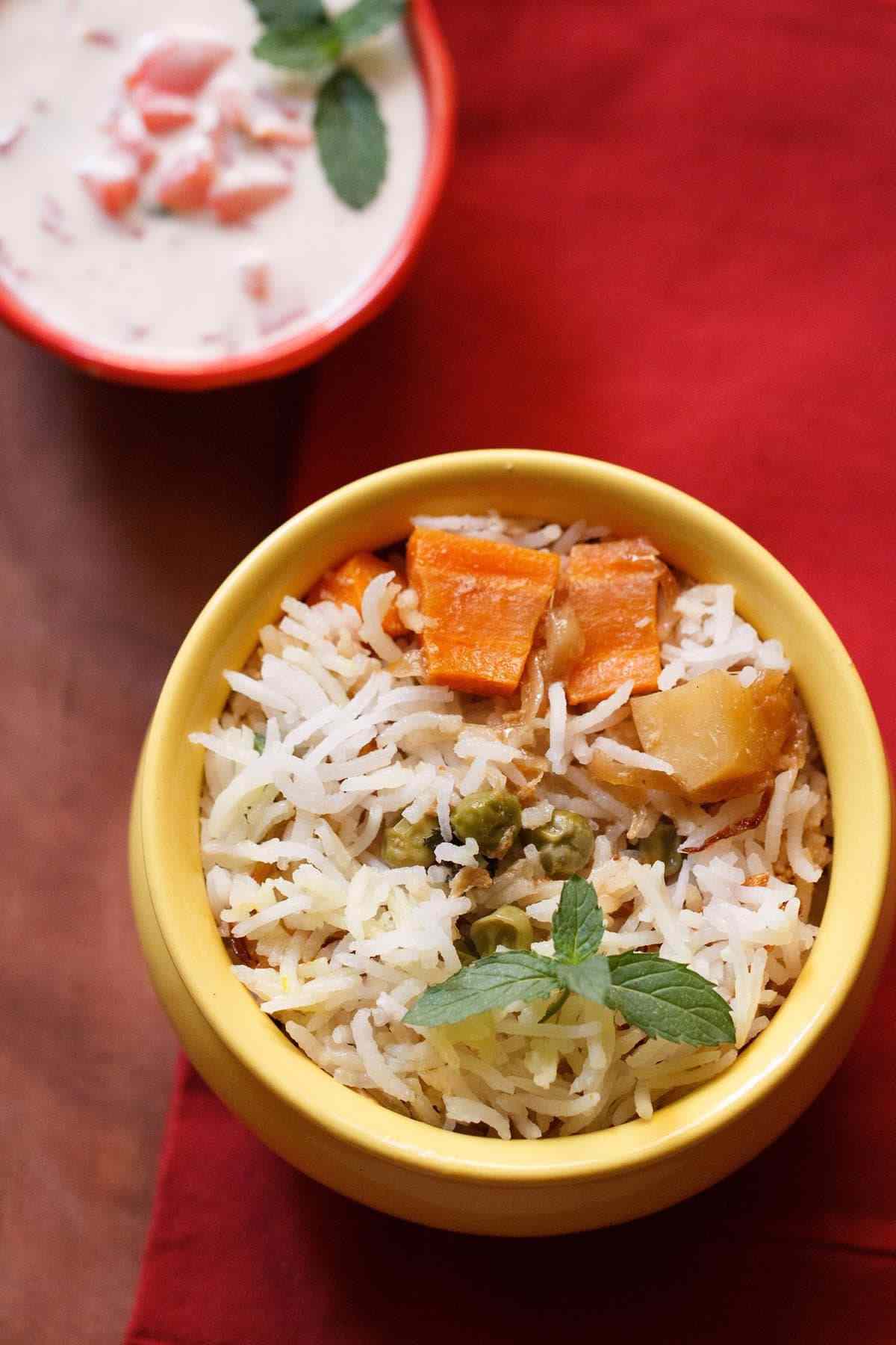 Veg. Tawa Biryani (with Raita)